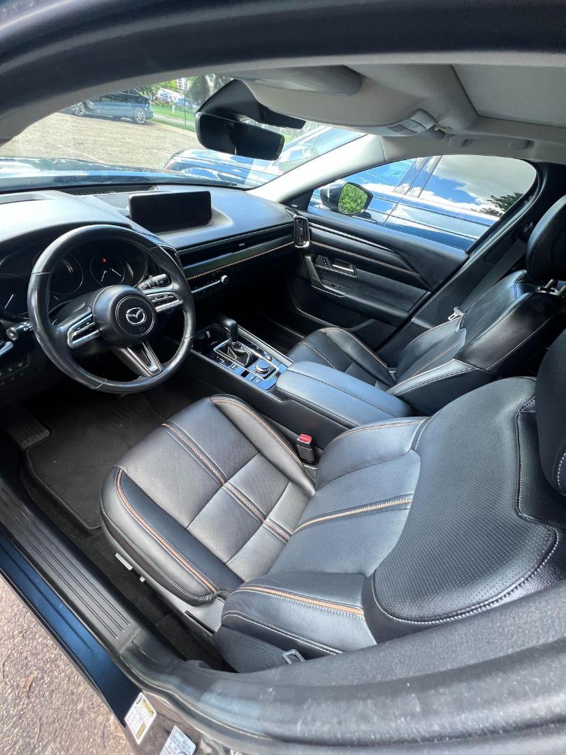 Used 2023 Mazda CX-50 TURBO PREMIUM PLUS with VIN 7MMVABEY7PN128259 for sale in Minneapolis, Minnesota