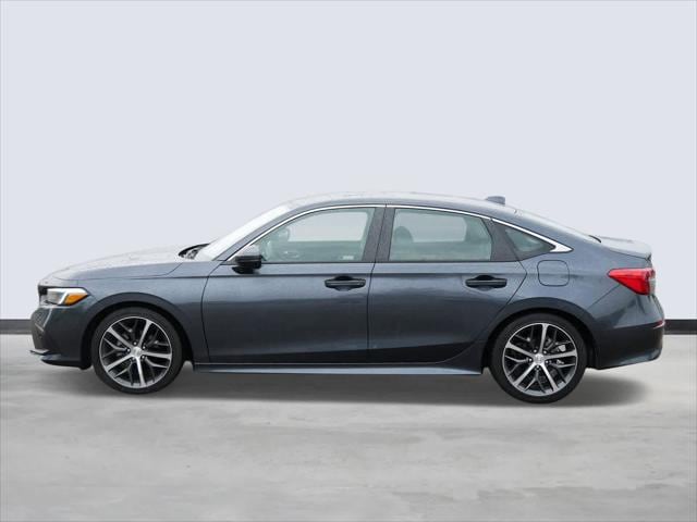 Used 2023 Honda Civic Touring with VIN 2HGFE1F99PH302157 for sale in Maplewood, Minnesota