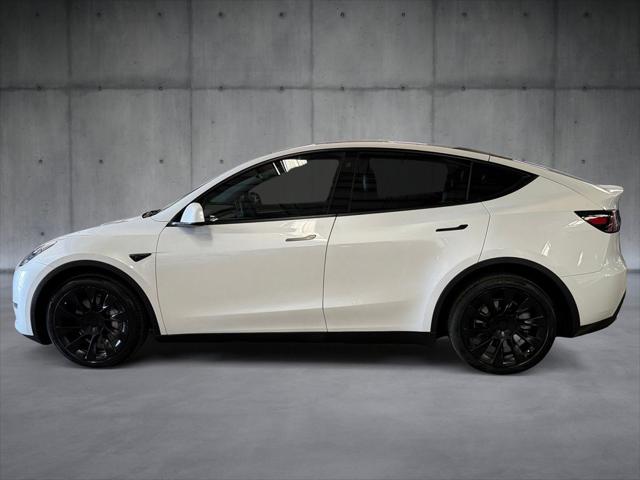Used 2023 Tesla Model Y Long Range with VIN 7SAYGDEE6PA065988 for sale in Kansas City