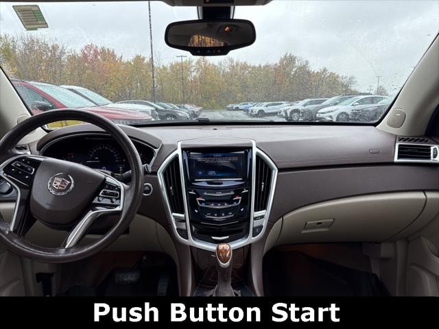 Used 2015 Cadillac SRX Luxury Collection with VIN 3GYFNEE32FS523558 for sale in Bowmansville, NY