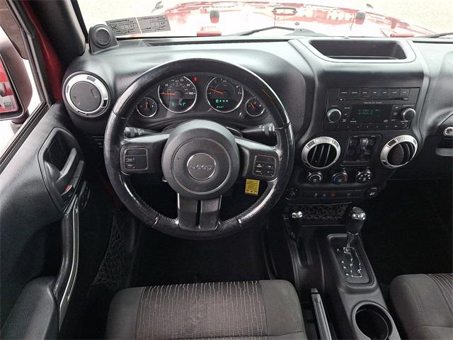 Used 2012 Jeep Wrangler Unlimited Rubicon with VIN 1C4BJWFG5CL128086 for sale in State College, PA