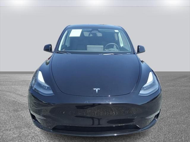 Used 2024 Tesla Model Y Long Range with VIN 7SAYGDEE2RA227537 for sale in Sanford, FL