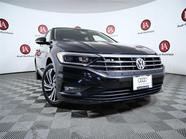 Used 2021 Volkswagen Jetta SEL Premium with VIN 3VWG57BU6MM017099 for sale in Richfield, Minnesota