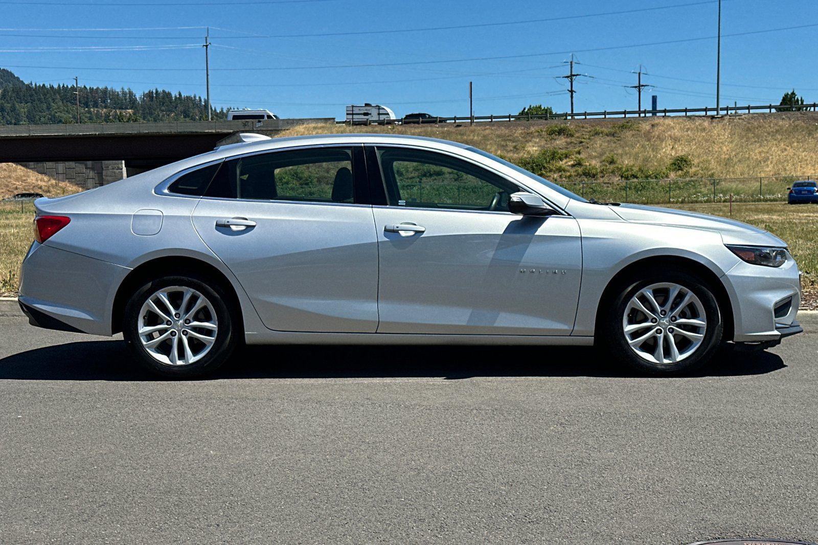 Used 2018 Chevrolet Malibu 1LT with VIN 1G1ZD5ST0JF142677 for sale in Eugene, OR