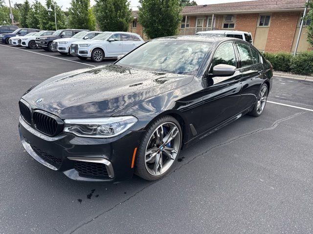 Used 2020 BMW 5 Series M550i with VIN WBAJS7C00LCD14964 for sale in Richfield, Minnesota