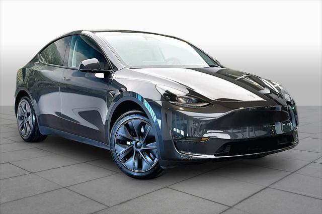 Used 2024 Tesla Model Y Long Range with VIN 7SAYGDED2RF096507 for sale in North Miami, FL