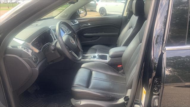 Used 2015 Cadillac SRX Luxury Collection with VIN 3GYFNEE38FS568925 for sale in Minneapolis, Minnesota