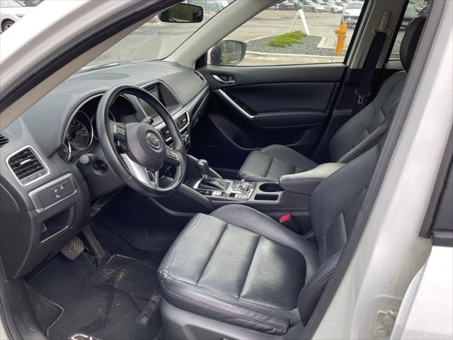 Used 2016 Mazda CX-5 Grand Touring with VIN JM3KE4DY4G0848966 for sale in Minneapolis, Minnesota