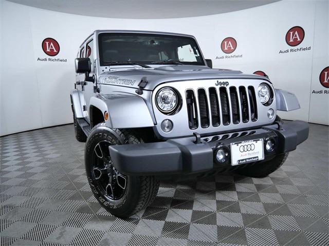 Used 2017 Jeep Wrangler Unlimited Smoky Mountain with VIN 1C4BJWEG8HL711714 for sale in Richfield, Minnesota