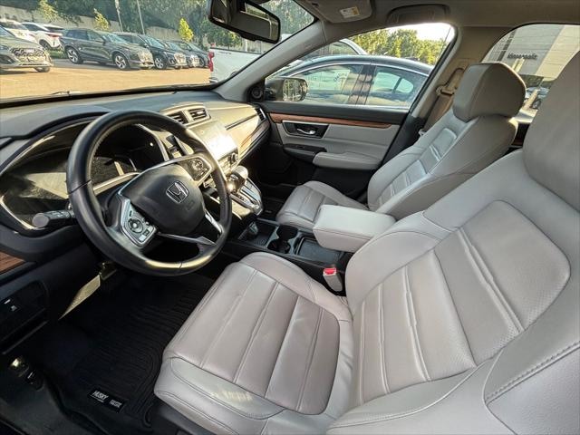 Used 2018 Honda CR-V EX-L with VIN 7FARW2H8XJE086517 for sale in Minneapolis, Minnesota