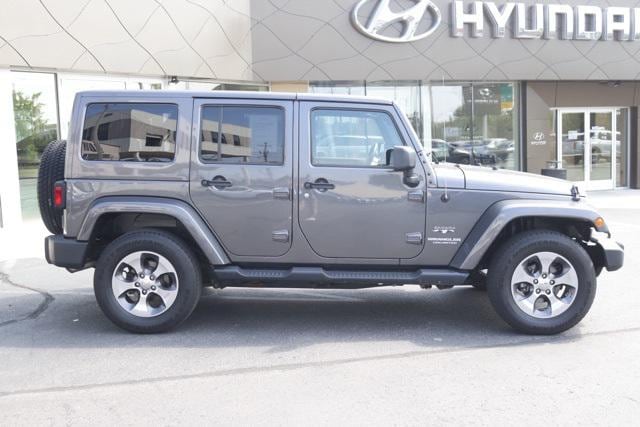 Used 2016 Jeep Wrangler Unlimited Sahara with VIN 1C4HJWEG5GL163034 for sale in Meridian charter Township, MI