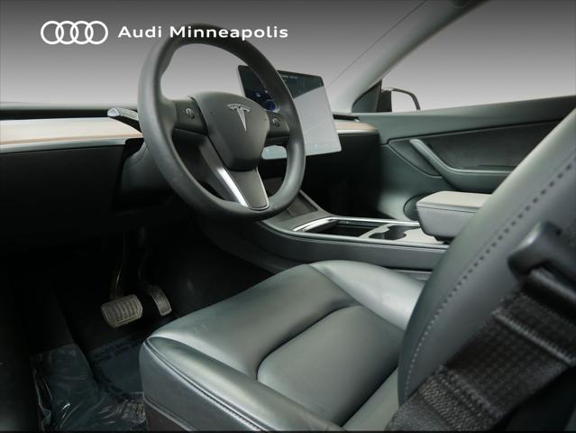 Used 2022 Tesla Model Y Long Range with VIN 7SAYGAEE0NF339281 for sale in Minneapolis, Minnesota