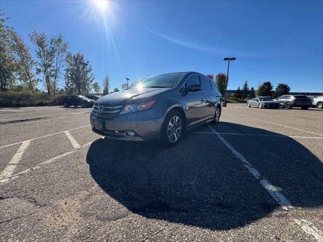 Used 2016 Honda Odyssey Touring with VIN 5FNRL5H92GB160732 for sale in Maplewood, Minnesota