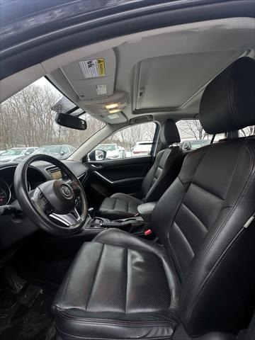 Used 2013 Mazda CX-5 Grand Touring with VIN JM3KE4DE5D0166440 for sale in Minneapolis, Minnesota